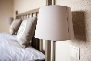 Łóżko lub łóżka w pokoju w obiekcie Apartamenty Za Murem