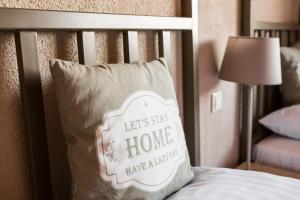 Łóżko lub łóżka w pokoju w obiekcie Apartamenty Za Murem