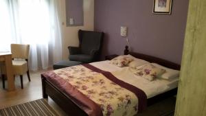 Posteľ alebo postele v izbe v ubytovaní Guest House Wolf