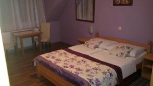 Posteľ alebo postele v izbe v ubytovaní Guest House Wolf