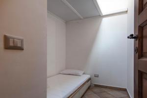 Postel nebo postele na pokoji v ubytování Il Convento sul Gizio