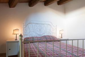 מיטה או מיטות בחדר ב-Il Convento sul Gizio