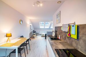 Kuchyňa alebo kuchynka v ubytovaní Apartament Rodzinny Mountain Aparts + 8 fotografií