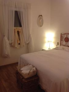 A bed or beds in a room at Il Gelsomino