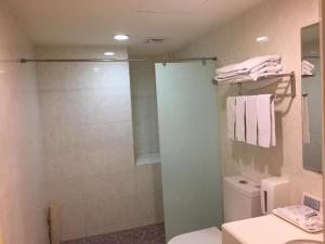Koupelna v ubytování Unic Hotel