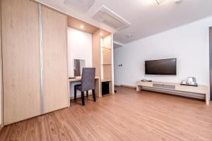 TV a/nebo společenská místnost v ubytování Hotel Shalom Jeju
