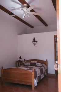 Voodi või voodid majutusasutuse La Casa de Cafe Bed and Breakfast toas