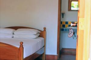 Voodi või voodid majutusasutuse La Casa de Cafe Bed and Breakfast toas
