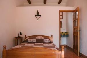 Voodi või voodid majutusasutuse La Casa de Cafe Bed and Breakfast toas