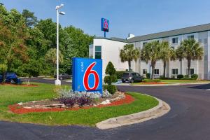 a sign in front of a building with a number six at Motel 6-Columbia, SC - Fort Jackson Area in Columbia