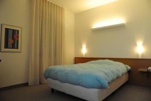 Posteľ alebo postele v izbe v ubytovaní Albergo Al Sole