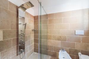 a bathroom with a shower and a sink at Casa Malu in Positano