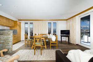 Televízia a/alebo spoločenská miestnosť v ubytovaní Kasperhof Apartments Innsbruck Top 6 - 7