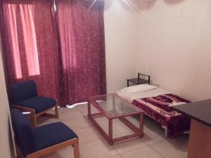 Ein Bett oder Betten in einem Zimmer der Unterkunft Property Direct Posidon Court
