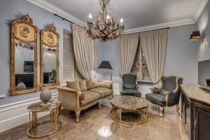 Χώρος καθιστικού στο Hotel & Spa Pałac Mała Wieś