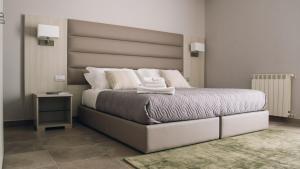 Postel nebo postele na pokoji v ubytování Alludo Aparthotel b&b