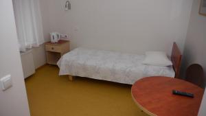 Postel nebo postele na pokoji v ubytování Hommiku Guesthouse