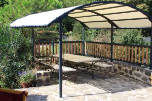 Patio nebo venkovní prostory v ubytování Ferme du Pic d'Allier