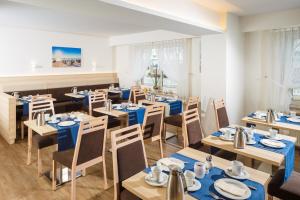 Ein Restaurant oder anderes Speiselokal in der Unterkunft Hotel Seeschwalbe 