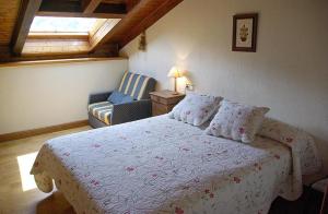 Tempat tidur dalam kamar di Casa Rural Parriola