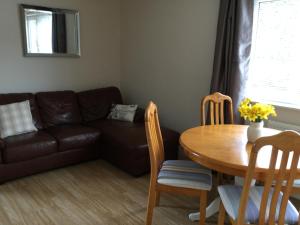 A seating area at Studio Apartment Fir Trees 