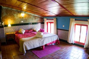 Ένα ή περισσότερα κρεβάτια σε δωμάτιο στο La Estancia Villa Rosillo +44 φωτογραφίες