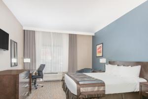 Cama o camas de una habitación en Wingate by Wyndham Niagara Falls