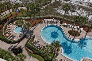 an overhead view of a swimming pool at a resort at Grand Panama by Panhandle Getaways in Panama City Beach