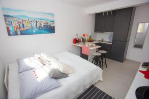 Postel nebo postele na pokoji v ubytování Studio apartment Laganini