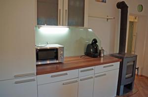 Kuchnia lub aneks kuchenny w obiekcie Stubai Apartment Telfes