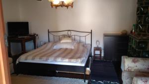 A bed or beds in a room at Country house Balaton