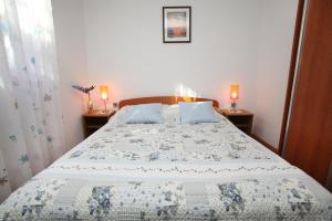 Postel nebo postele na pokoji v ubytování Apartment Miletic