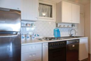 Dapur atau dapur kecil di Bilocale Cala Ruja- Costa Smeralda +20 gambar