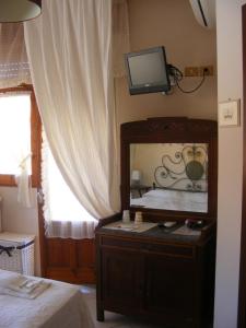 TV a/nebo společenská místnost v ubytování B&B Casavale