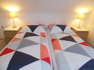 Ein Bett oder Betten in einem Zimmer der Unterkunft Apartment Seven Ducks
