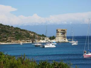 a group of boats in a body of water at Chambres d'hôtes Multari in Patrimonio