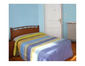 Postel nebo postele na pokoji v ubytování Hostal Bayón