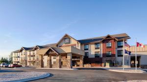 a rendering of a hotel on a street at Red Lion Ridgewater Inn & Suites Polson in Polson