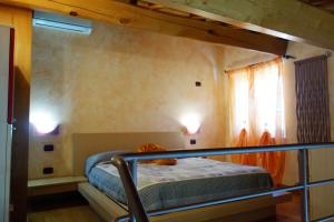 Posteľ alebo postele v izbe v ubytovaní House Versilia Luca E Giada, 5 chilometri da Forte dei Marmi!