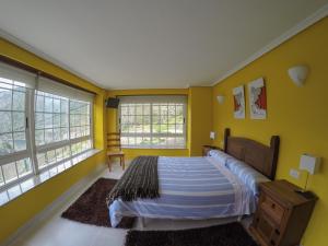 A bed or beds in a room at Olar de Rabacallos