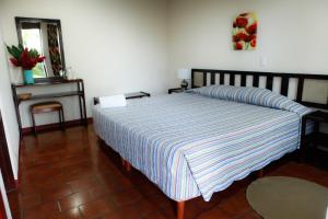 Postel nebo postele na pokoji v ubytování Hotel Maribu Caribe