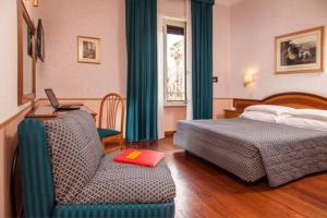 Posteľ alebo postele v izbe v ubytovaní Hotel Piemonte