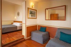 Posteľ alebo postele v izbe v ubytovaní Hotel Piemonte