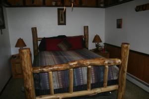 Tempat tidur dalam kamar di Dreamcatcher Bed and Breakfast