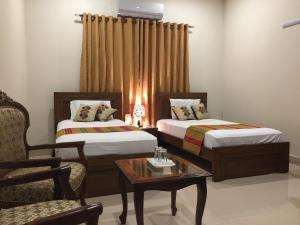 Katil atau katil-katil dalam bilik di Star Guest House