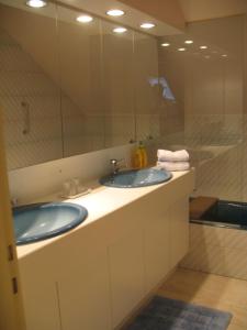 Een badkamer bij B&Logies De Duinroos Koksijde