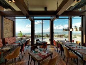 A restaurant or other place to eat at Ariana Sustainable Luxury Lodge - Special Category - Cappadocia