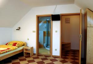Posteľ alebo postele v izbe v ubytovaní Pension Camp Prager