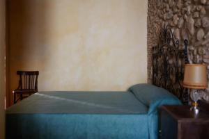 Ein Bett oder Betten in einem Zimmer der Unterkunft La Requisa