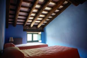 Ein Bett oder Betten in einem Zimmer der Unterkunft La Requisa